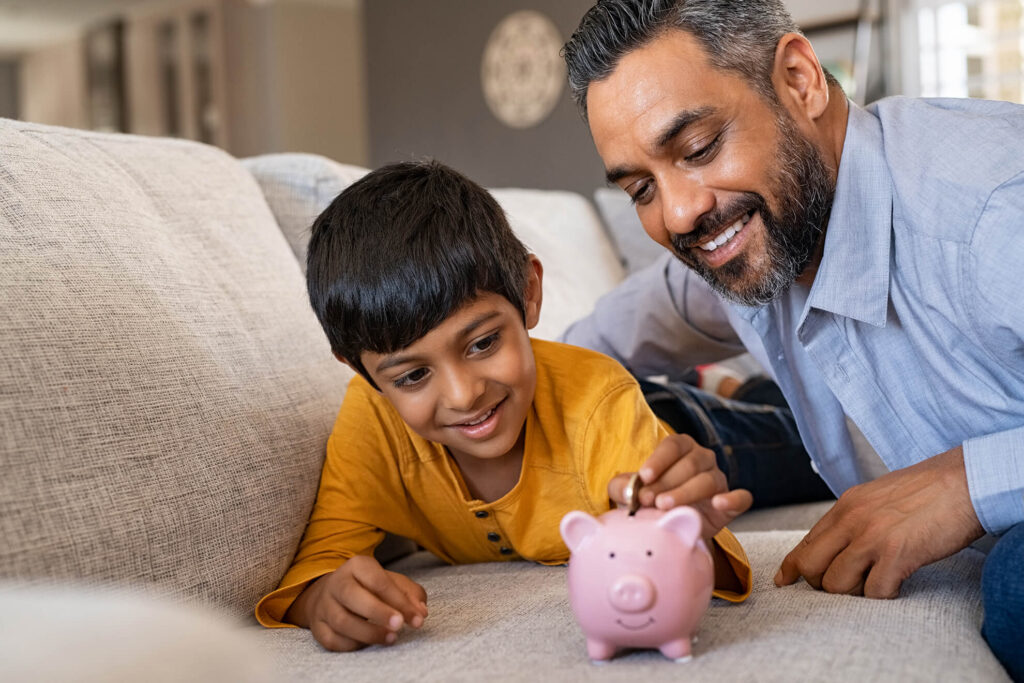 home insulation for cosy home with man and boy on sofa