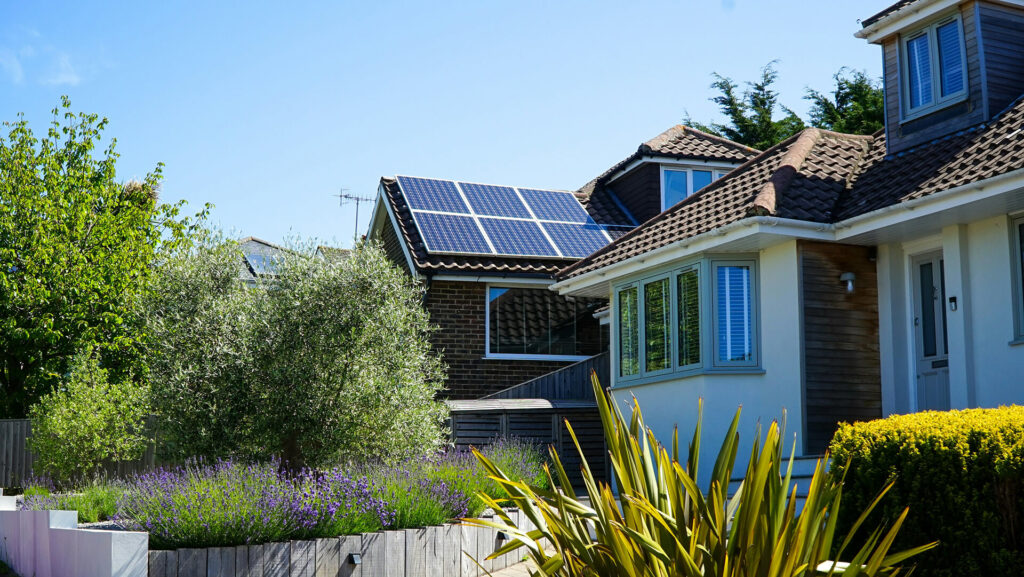 houses with solar pv panels on roof